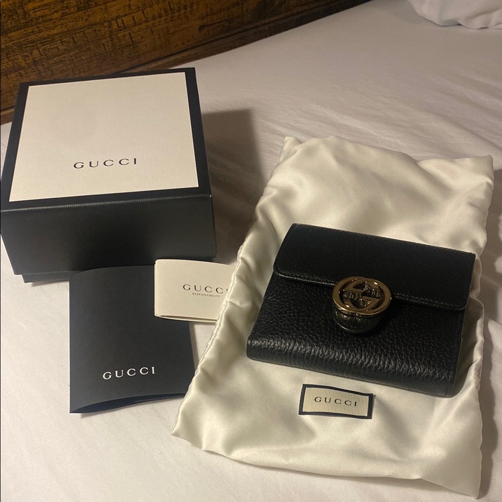 Gucci Black Leather Wallet with Gold Emblem